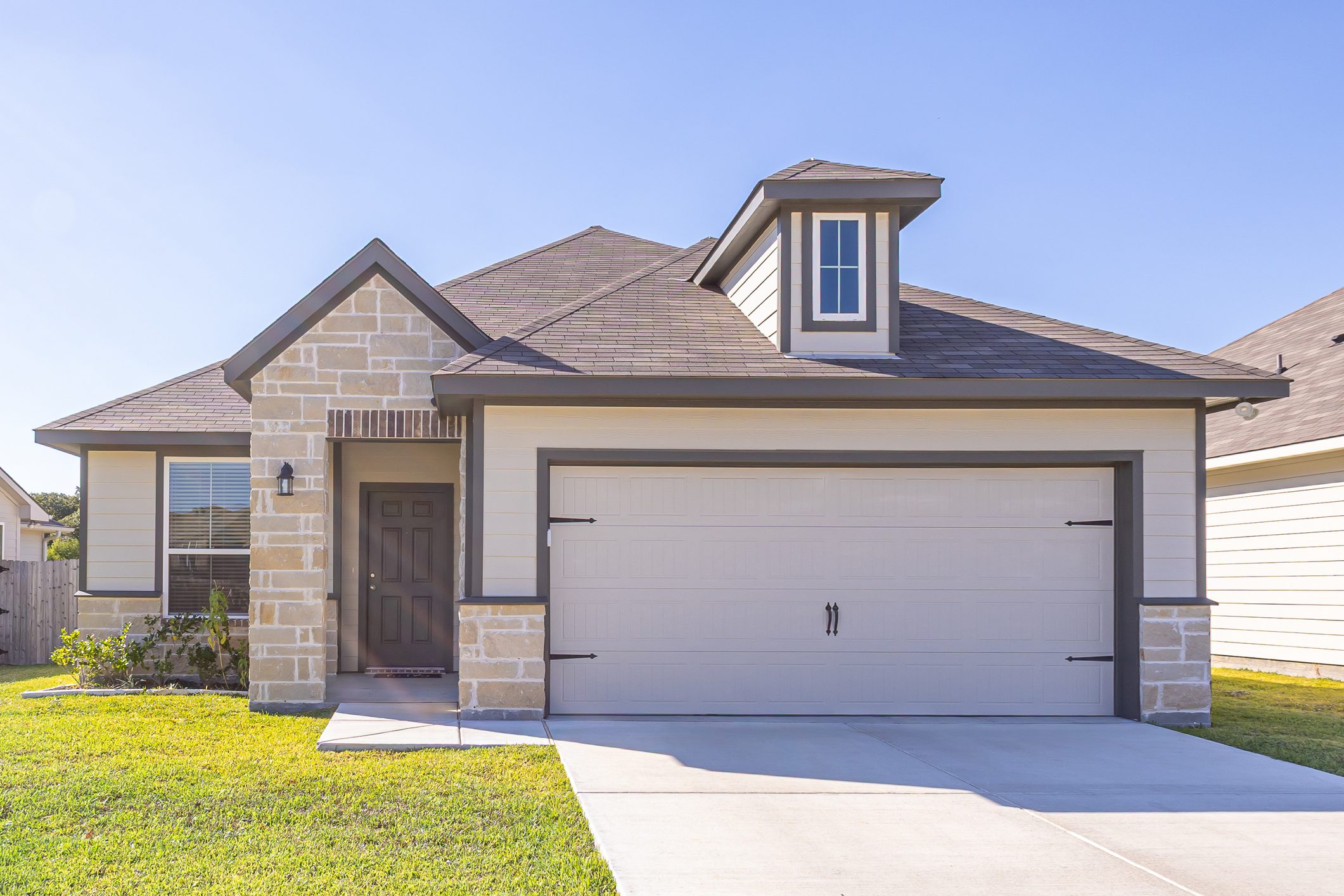 Suburban single-story house with two-car garage
